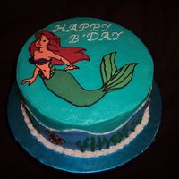 Under The Sea With The Little Mermaid This is a marbled vanilla and chocolate cake with buttercream frosting. Ariel was made using the frozen buttercream transfer technique (my...