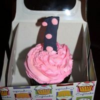 Smash Cupcake A smash cupcake for a 1yr old. Made the 1 out of fondant which I inserted a toothpick in before harding in the freezer so It would stand...