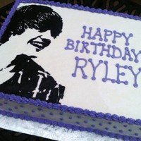 Justin Bieber Cake Justin Bieber Cake done for a childs birthday party. Single layer chocolate cake with bc icing. Picture is a FBCT.