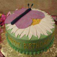 Butterfly Birthday Cake Cake made for my boss' birthday. frosted in bc, flower and butterfly are fondant.