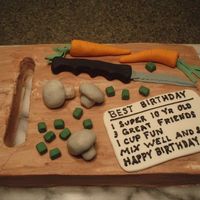 P5020118.jpg A friend was having a cooking party for her daughter's 10th birthday so I created this cutting board cake. its frosted with bc,...