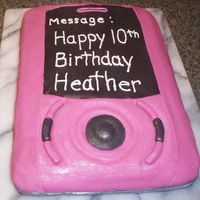 Cell Phone Cake Simple sheet cake covered in fondant. It was okay but i could have done better.