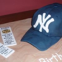 Yankee Hat Birthday Cake My first hat cake. Requested by a friend to resemble a well worn, wrinkled hat. Was for his dad's birthday. Hat is yellow cake with a...