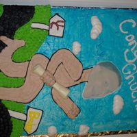 Streaker This was done for my good friends graduation.The face is an edible image, copy confection. The diploma is white chocolate. The rest is...