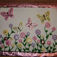 White Chocolate Butterfly This was done for a baby shower where my husband works. The flowers and butterflies are white chocolate dusted with super pearl.