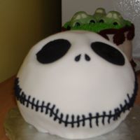 Jack Skellington This is a 6" ball pan covered in MMF. I absolutely love Nightmare Before Christmas so this was my own birthday cake! It was a...