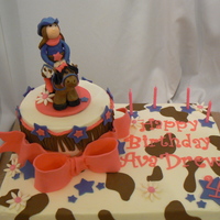 Ava Drew's Cowgirl Cake 11 X 15 chocolate sheet with 6" round. All buttercream. Candy clay accents. Girl and horse are candy clay with Tylose added. Thanks...