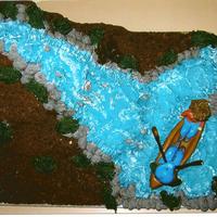 Canoeing This was a cake that I made for my husband's birthday.