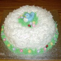 Bluebird All buttercream with fondant bird and flowers.