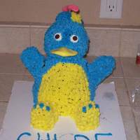 Pablo: Backyardigan First attempt at a 3d cake for my daughters first birthday. Chocolate cake with buttercream frosting. The bill and top were made from taffy...