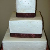 Square- 6" Tall Tiers This bride was very "interesting". The bottom tier is fake. The top two tiers are 2 inches of stryofoam with 4 inches of cake on...