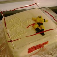 Wrestling what a pain in the neck!!! I tried string licorice for the ropes and couldn't get it to work,so I ended up using ribbon which looked...