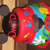 Mickey Mouse Clubhouse WASC cake made with the "funfetti mix". Covered in fondant with fondant details. Mickey hat on top is made with half the Wilton...