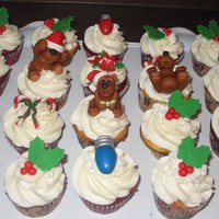 Christmas Cupcakes Christmas cupcakes made for family and friends. All decorations are made of fondant. Red velvet cupcakes w/cream cheese frosting and egg...