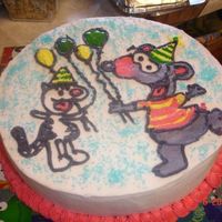 Toopy & Binoo Buttercream freehanded on cake