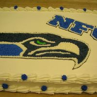 Seahawks Cake I made this cake for the dining hall where i work. I was in a hurry but i think it went ok.
