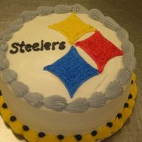 Steeler Cake I made this cake for my family, who are major Steeler fans. It was just a last minute cake i decided to make.