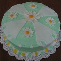 Green Cake green buttercream icing. gumpaste flowers.