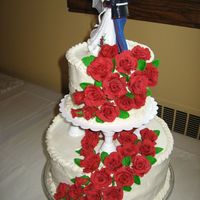 Red Rose Wedding Cake roses are fondant, cake is buttercream