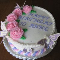 Pink Roses, Purple Butterflies roses and icing are buttercream. butterflies are white chocolate candy