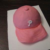 Pink Phillies Cap cap is covered with fondant. made this for a friend who has breast cancer