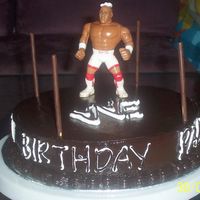 All Chocolate Cake Made this for my dad's 75th Birthday. He loves wrestling so much that gave me the idea for this cake. Chocolate sponge with chocolate...