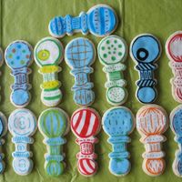 Baby Rattles subaru's cream cheese sugar cookie recipe coverd in MMF and decorated with food markers.