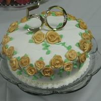 50Th Anniversary-White W/ Gold Roses This is very similar to the other 50th anniversary cake I did. This one has roses colored with gold luster dust, green vines and leaves,...