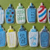 Baby Bottle Cookies Subaru's cream cheese sugar cookie recipe covered with MMF and decorated with food markers.