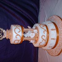 My First Anniversary Cake White cake. Ivory buttercream icing with royal icing dots. Gumpaste flowers.