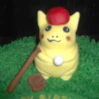 Pokemon Party my version of a gumpaste/fondant picachu, with his backwards baseball hat - all ready for a game with his little league buddies at this...