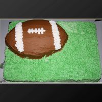 Let's Play Some Football Football chocolate cake with cream cheese filling the grass frosting I did buttercream.