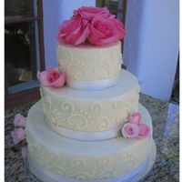 1St Wedding Cake! 14, 10 & 6. Killer Chocolate Cake, Raspberry coulis w/ chocolate ganache. All covered with French Buttercream! Delicious!!! Very happy...