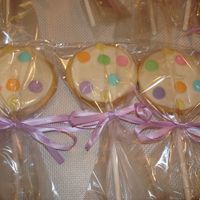 Rattle Cookies Here are some NFSC I made as favors for a baby shower. I used melted white candy melts and jumbo spinkles for the dots on the rattle.