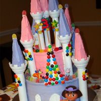 Princess Dora Candy Castle This is the cake I made for my 3 year old's birthday this past weekend. It is based on the Wilton Candy Castle cake that she picked...