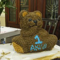 1St Birthday Teddy Bear Cake I made this using the wilton 3d teddy bear pans for my babys 1st birthday!
