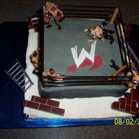 Wrestling Cake A wrestling cake for a little boy who loves wrestling. Fondant and buttercream.