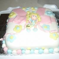 Birthday Present Cake This cake was done for a class and was my first try at fondantmy husband and Ijoke the little girl on top looks like a femal ziggy