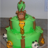 Jungle Baby Shower I made this cake for a girl baby shower. The mom-to-be wanted to do something that had nothing to do with pink, and she also wanted green...
