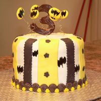 Cake13_015.jpg last minuet batman cake for a 3rd b-day. banana cake with cream cheese icing and mmf. almost tossed this cake out the window, my mmf just...