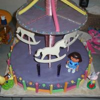 Belle's Merry-Go-Round I made this for my daughters 2nd birthday. The base is chocolate ripple cake