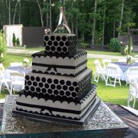 Ashley's Wedding Cake strawberry cake with cream cheese icing. frosted with buttercream and covered in wedding white buttercream flavored fondarific (i love that...