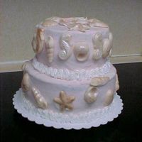Shells This is a two tier shell cake made for my sister-in-laws 45th wedding anniversary. It is a chocolate fudge cake with chocolate mocha...