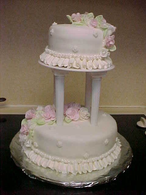 Class Iii Final Cake I made white and light pink roses for my final cake. Our instructor let us have the option of color scheme as long as the cake was white....