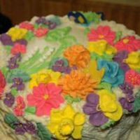 Fancy Flowers I loved this class it was a lot of fun. All the flowers are royal icing except the blue rose and the orange mums.