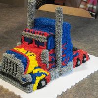Optimus Prime Semi Truck All buttercream Optimus Prime semi, for cousins birthday. Stacks are pretzel rods covered in butter cream. I used a 1/2 sheet cake and then...