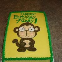 Monkey Cake Banana cake with fresh strawberries in layers and strawberry buttercream frosting. This was for my husband's b-day... he loves Monkeys...