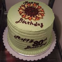 My Grandma's Birthday Cake this cake was around 7" high. the flower and writing were done with chocolate.
