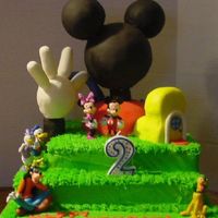 Mickey Mouse Clubhouse The is the cake for my son's second birthday. He loved it!!! The Club house is covered in Fondant and the yard is covered in BC. I...