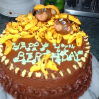 Monkeys And Bananas Chocolate cake with chocolate buttercream. MMF decorations.